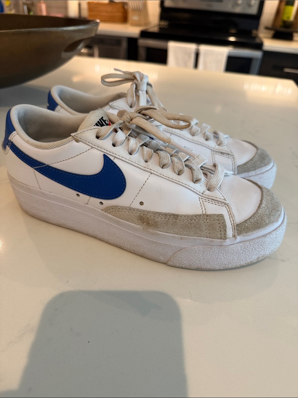 Nike White Sneakers with Blue Swoosh and Gray Suede Accents